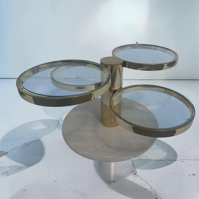Striking and rare vintage modern coffee table by Leon Rosen for Pace Collection features four brass plated cantilever...