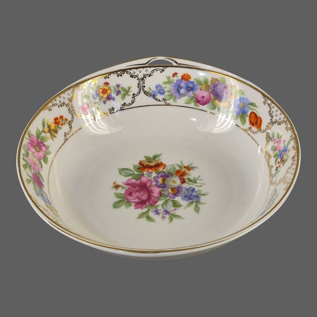 The Vintage Seld Bavaria Rosenthal Floral "Donatello" Serving Bowl is a beautifully crafted piece of porcelain featuring a...