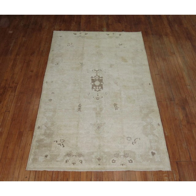 Mid 20th Century Turkish Oushak Rug with a formal pattern is neutral colors. 5'1'' x 8'8''