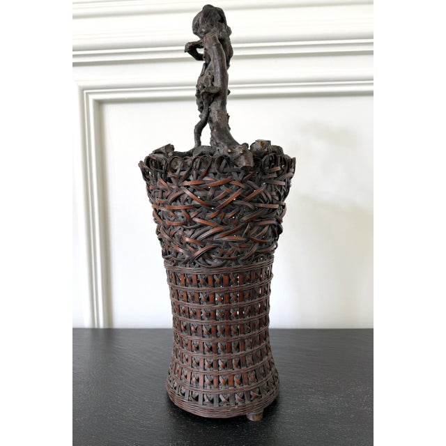 This is a beautiful antique Japanese bamboo flower basket (ikebana) dated to the late 19th century, late Meiji Period. The...