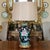 A fine and dramatically decorated black ground Famille Noir porcelain vase with prunus branches, peony flowers and...