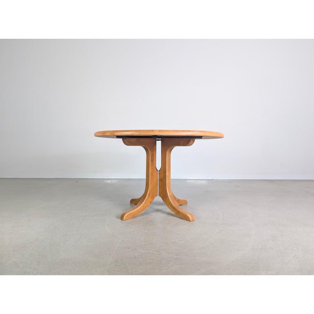 We are offering a beautiful extendable dining table by Rainer Daumiller from the 1960s for sale. with its extension leaf,...