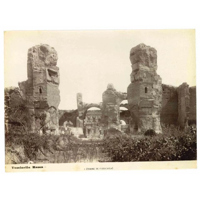 Baths of Caracalla is a vintage black and white photograph realized by an anonymous artist in the 20th Century. Good...