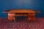 Extraordinary Liberty centered thuja briar writing desk with five drawers. The center drawer is finely decorated with...
