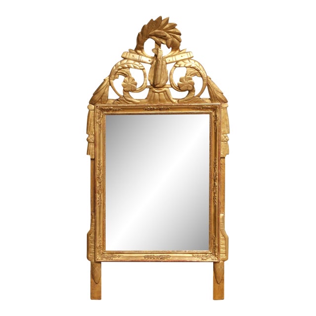 18th Century French Louis XVI Provencal Giltwood Mirror With Lyre Crest For Sale