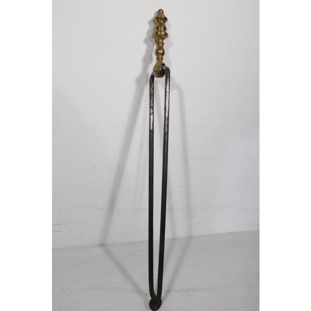 Antique fireplace tong tools, constructed of steel and brass. This tool is in excellent, original, clean and ready to use...