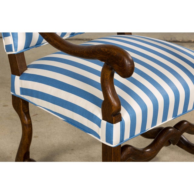 A striking pair of late 19th century French Louis XIII style armchairs, sourced in Provence, France, defined by their...