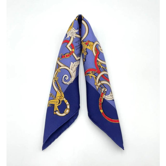 An exquisite 21st-century Hermès silk pocket square featuring the iconic "L'Instruction du Roy" design by Hugo Grygkar....