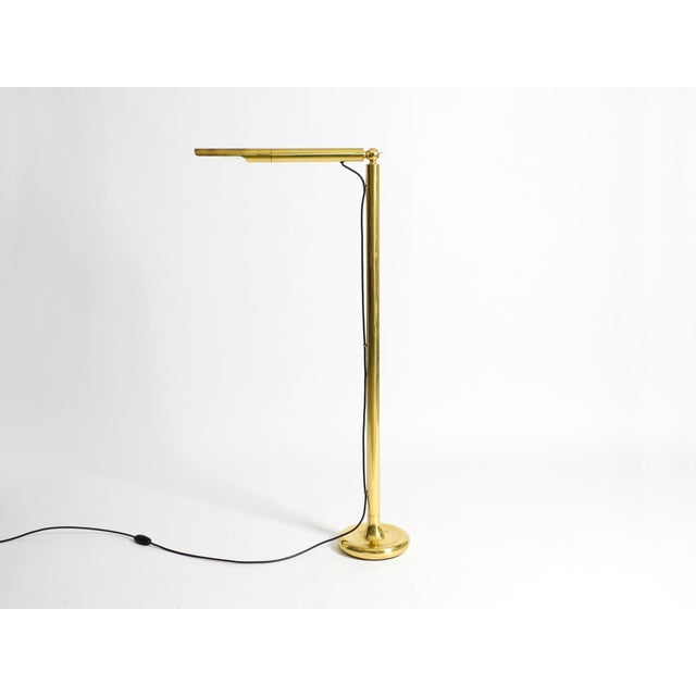 Original 1960s brass floor lamp, model pole light. Design by ingo maurer. Manufactured by m-design. Made in germany. great...