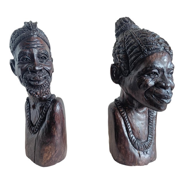 Early 20th Century Exquisite Pair of Iron Wood Carved Shona Male and Female Bust For Sale