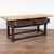This handsome library table with two drawers rests on simple carved legs and trestle base. The base has been given a...