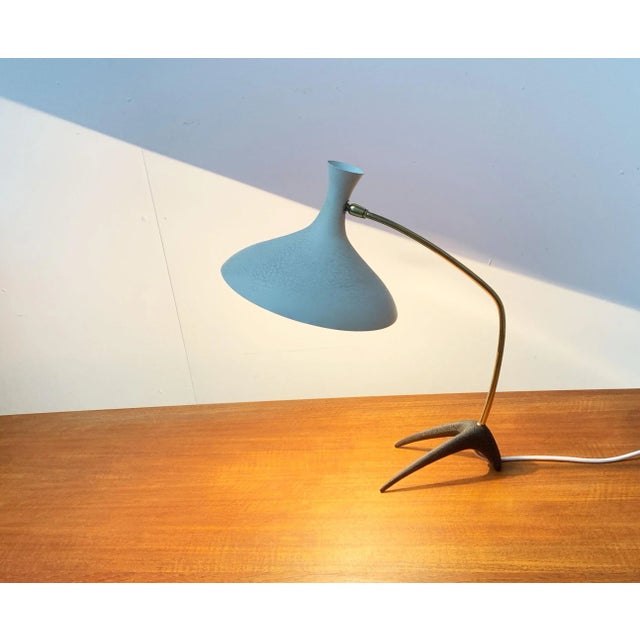Mid Century table lamp by Cosack. This and similar designs are often attributed to Louis Kalff. However, there are no...