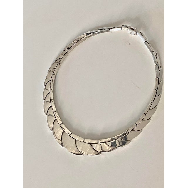 Sterling Silver Taxco, Mexico created artisan necklace in an articulated Modernist design. Very heavy piece, weighing 150...