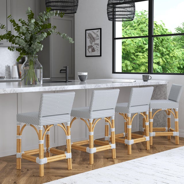 Combining clean lines with tropical materials, this Butler Specialty Company stylish low back counter stool infuses modern...