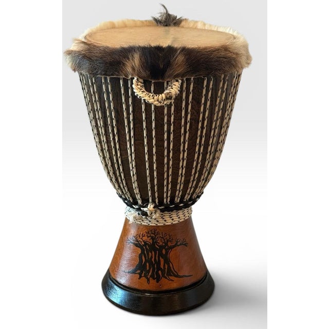 Professional West African Djembe Hand Carved Baobab Tree Drum With Case This professional-grade West African djembe...