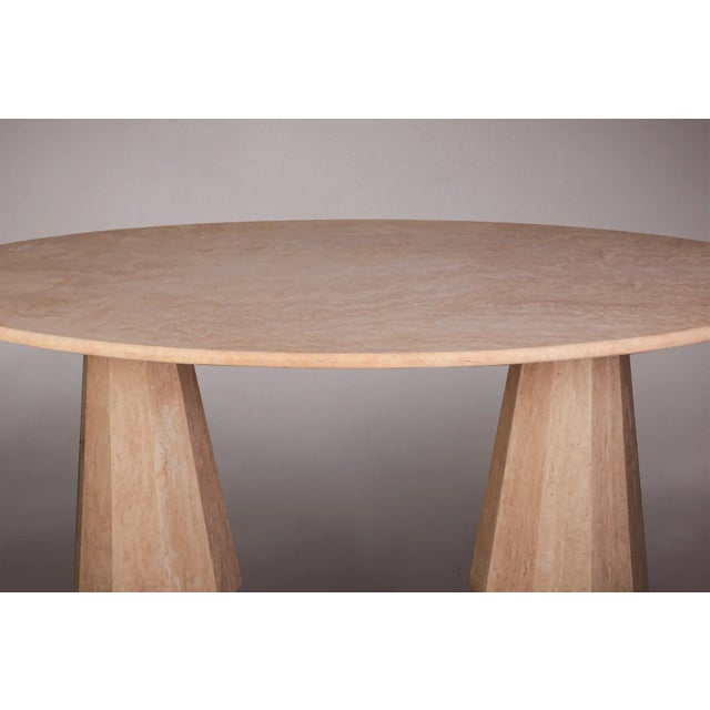 Transform your dining space with our exquisite Double Conical Leg Travertine Dining Table. Crafted from premium travertine...