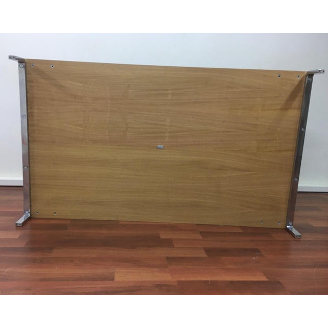 Greggy coffee table (686) designed by Emaf Progetti (1999) for Zanotta. This coffee table has polished aluminum alloy...