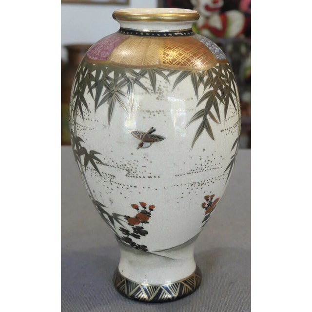 Up for sale is a Circa 1915 Japanese Satsuma Ware Porcelain Bamboo/Bird/Floral Motifs Baluster Vase (Taisho Period)! It...