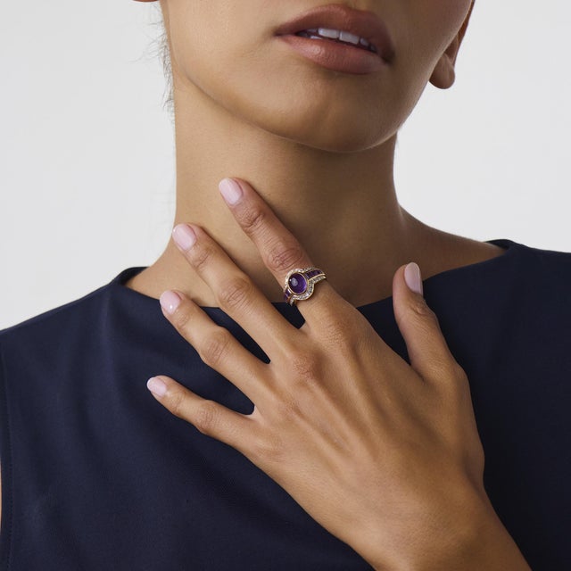 This beautiful vintage amethyst and diamond ring is a bold 1980’s design, centered by a cabochon cut amethyst weighing...