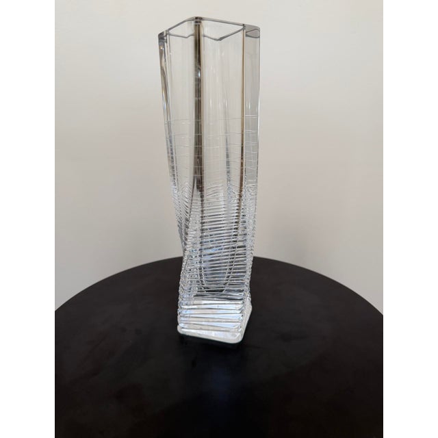 Modern Japanese clear crystal vase featuring a sculptural “twisting illusion” form, marked on the underside and attributed...
