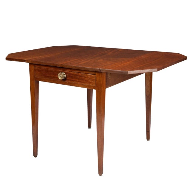 American Hepplewhite drop leaf Pembroke table in Honduran mahogany with a wide rectangular single board top on a...