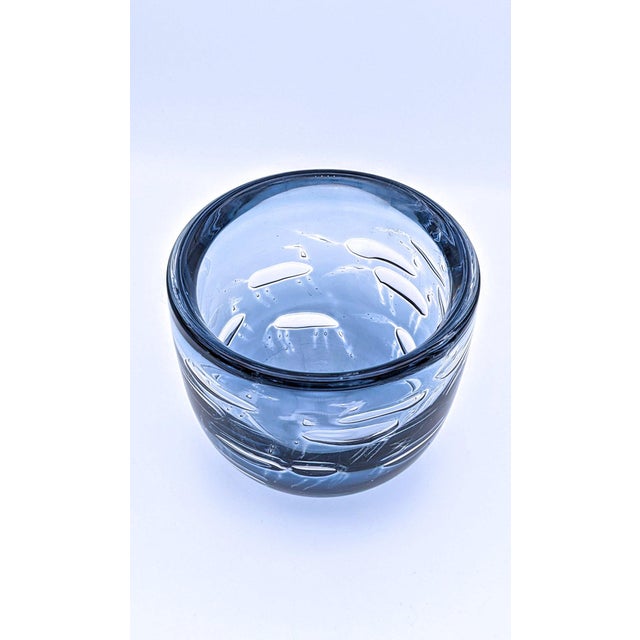 This exceptionally rare and highly collectible mid-century modern art glass vase is a masterpiece of Swedish design,...