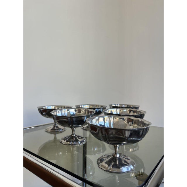 The highly sought-after stainless steel cups in a classic edition. Perfect for serving ice cream or tapas. Price is for...