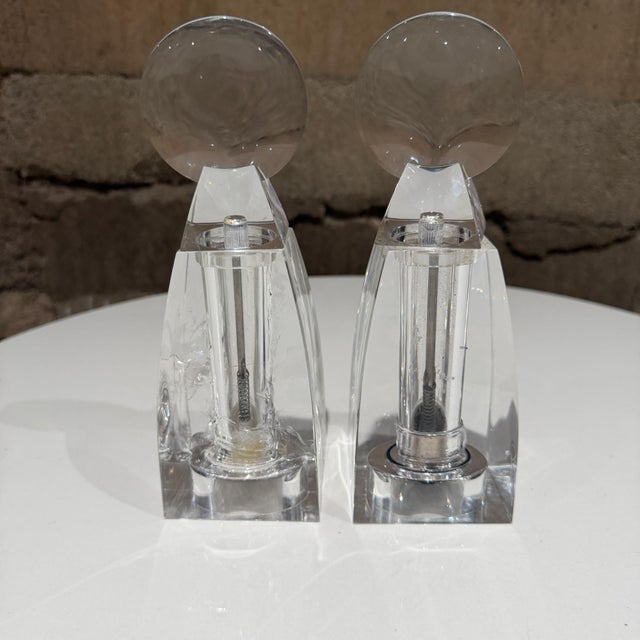 For your consideration ,a set (2), Grainware Lucite salt and pepper grinders designed by artist Wayne Husted. Made of...