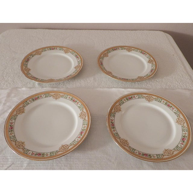 This marvelous set of 4 antique luncheon or dessert dishes is created in gorgeous white porcelain with hand-painted gold...