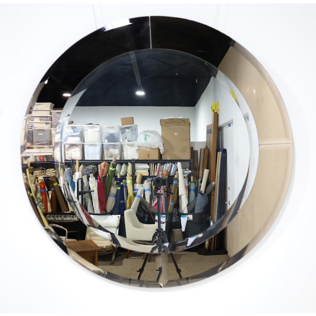 This mirror always catches everyone's eye due to its simplicity and striking design. Designed and made by Karl Springer in...