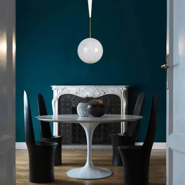 Amazing and rare pendant with a precious hand blown reticello Murano glass sphere designed by Carlo Scarpa, 1940....