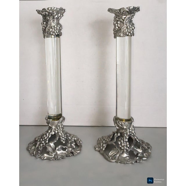11" tall etain zinn candlesticks. pewter base and cup with grape motif. glass column. excellent condition