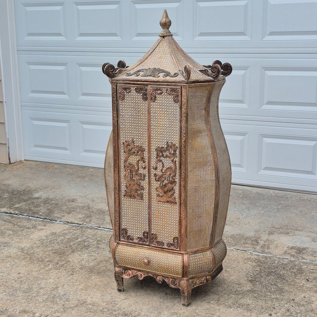 I've never seen anything like this remarkable vintage chinoiserie style cabinet. It's small (only 5 feet tall) and...