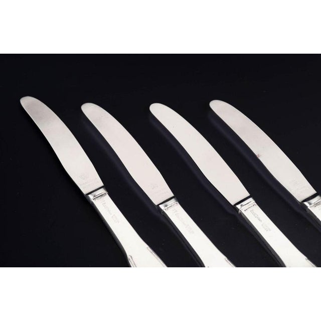 Evald Nielsen lunch knives, set of four. Model number 14. Elegant lunch knives in sterling silver and stainless steel....