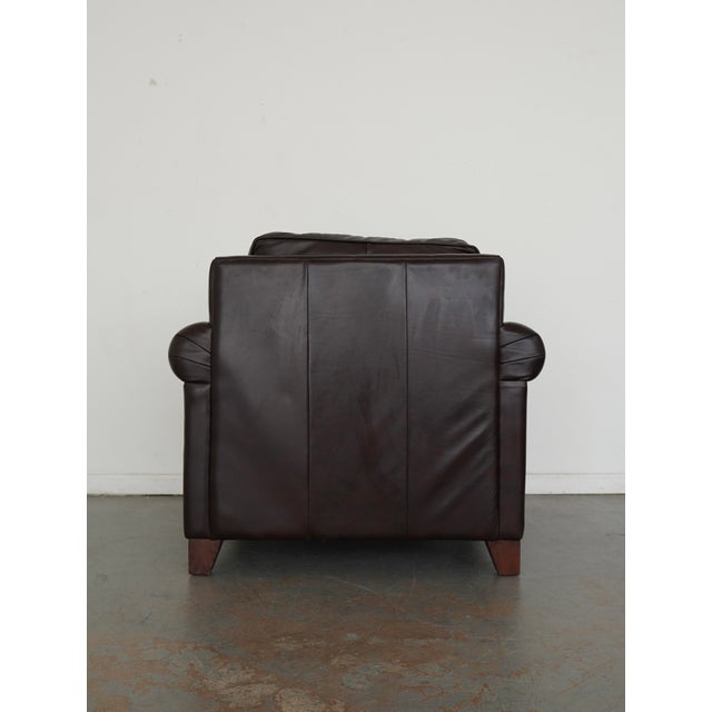 This Pottery Barn Cameron chair is crafted with classic roll arms and removable hardwood legs, offering a clean, tailored...