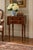 A handsome English Regency rosewood work table dating to approximately 1820–1840, displaying the refined proportions,...
