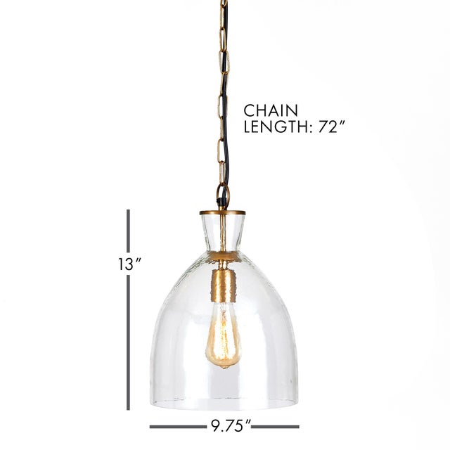 In a classic mix of warm brass and seeded glass, the Belle pendant is a traditional fixture. Over an island, in an entry...