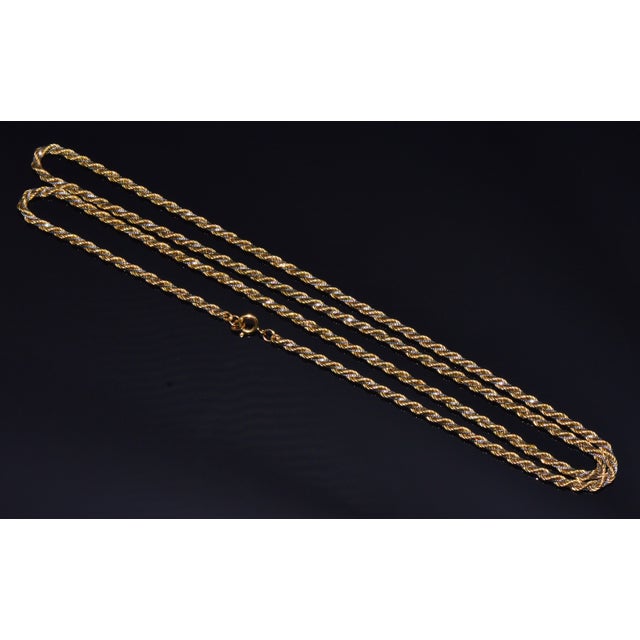 Top-quality estate Italian solid 14K two-tone gold twisted rope chain necklace. This impressive 30.25-inch chain features...