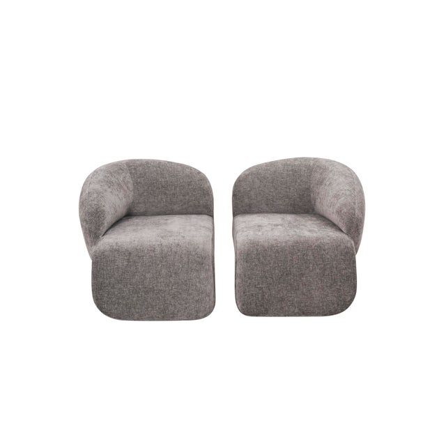 Set of 2 right arm and left arm accent chairs in brown chenille fabric has matte brass bases made of powder-coated iron....