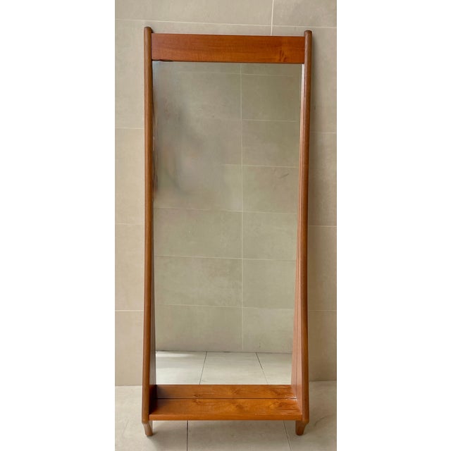 Exceptional Pedersen and Hansen wall mirror. The elegant lines of this mirror make it stunning in profile as well. Slender...