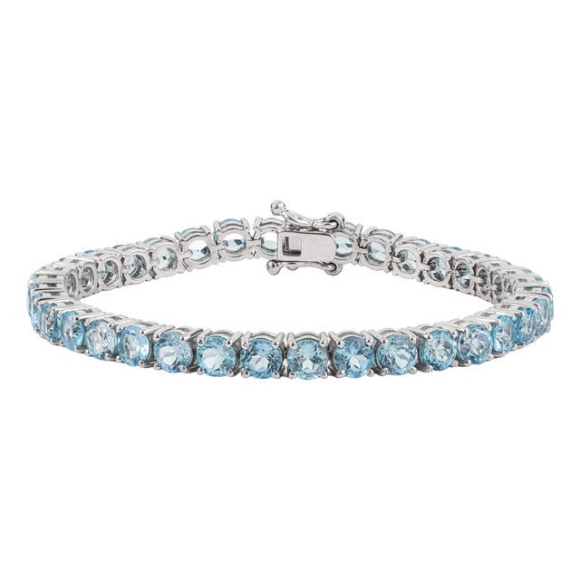 Early 21st Century 20 CTTW Blue Topaz Tennis Bracelet in 925 Sterling Silver 7 Inch For Sale
