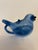 This vintage chinoiserie style mid-20th century blue bird shaped cermic vessel often used as a small teaport or...