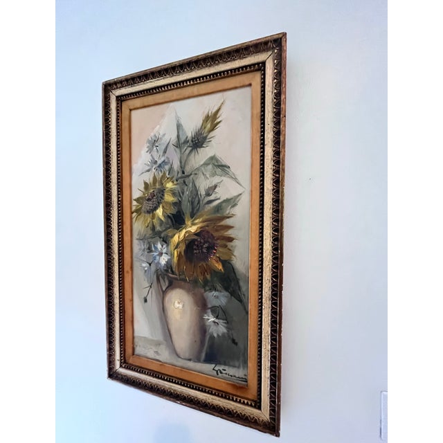 A striking vintage Italian oil painting by Grimani depicting a lush arrangement of sunflowers and wildflowers in a simple...