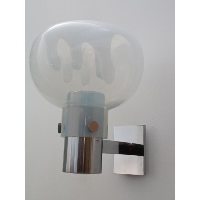 Spectacular wall sconce by Toni Zuccheri for VeArt. Italy, 1970s. A very rare piece by this fabulous designer. Chrome-...