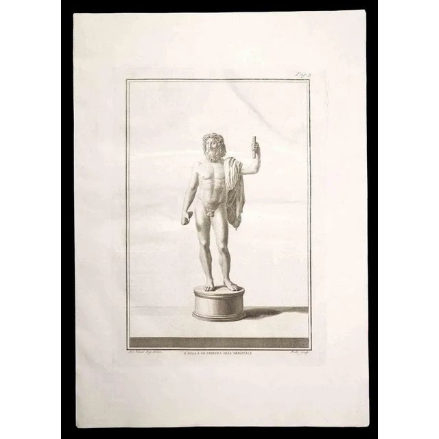 Ancient Roman Statue, from the series "Antiquities of Herculaneum", is an original etching on paper realized by Carlo...