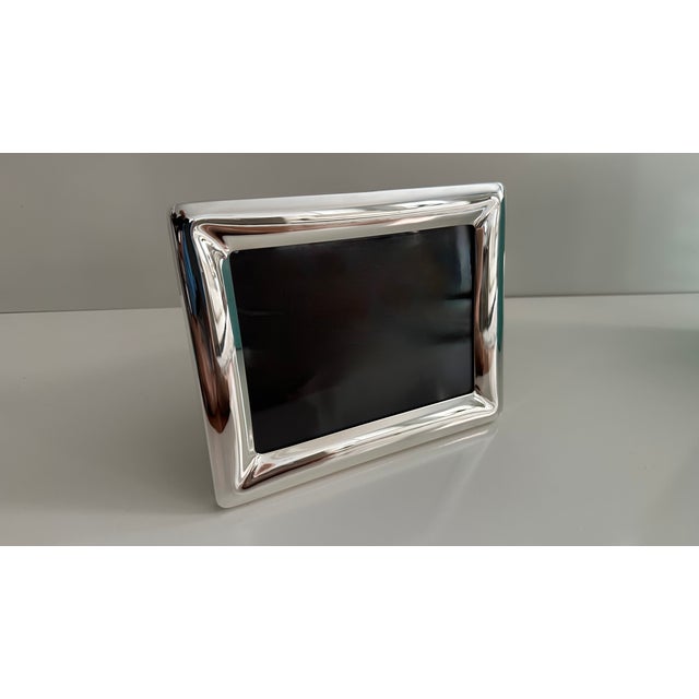 Gorgeous sterling silver Tiffany & Co. frame designed by Elsa Peretti in excellent vintage condition with no visible...