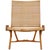 Hans J. Wegner lounge chair model JH-512 with a seat and backrest of wicker, and frame of oak. The chair is from the 60s...