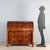 Early 19th-century Empire walnut bureau, featuring an elegant and functional design. The front has three drawers,...