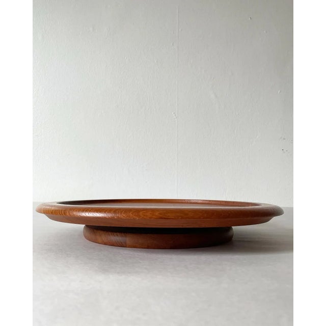 A beautiful mid century modern Danish teakwood lazy Susan. Great warm color and wonderful condition marked on the bottom...
