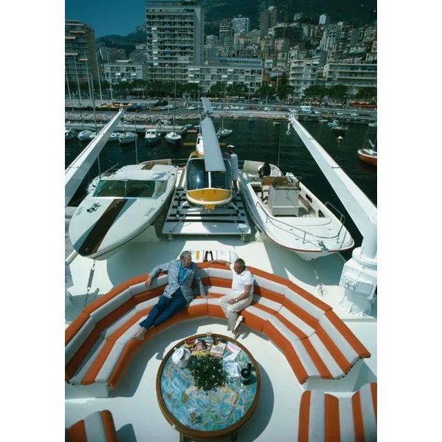 Transport Buffs 1961 A helicopter and two motor boats adorn the deck of a luxury yacht where Roy J Craven and Prince...